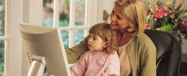 Mom and daughter on computer