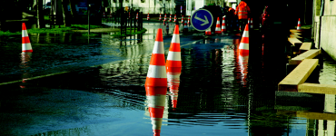 Safety cones in flooded street