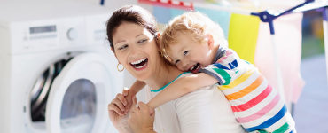 Mom and son in laundry room