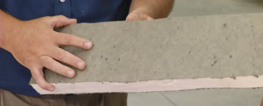 Man showing insulation material