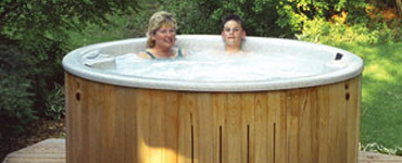 Mom and son in hot tub