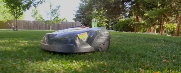 Electric robot mower on lawn