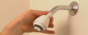 Low-flow showerhead being installed